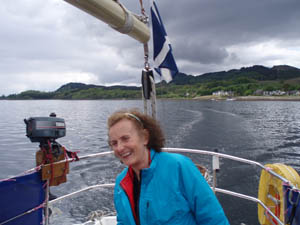 Jean at the helm of the yacht
