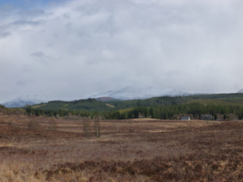 Moorland and snow covered hills near Tulloch