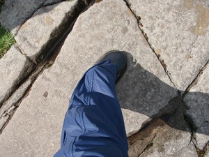 Jean's foot in the footprint recess