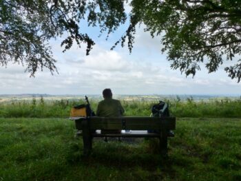 Alan on a bench with a view