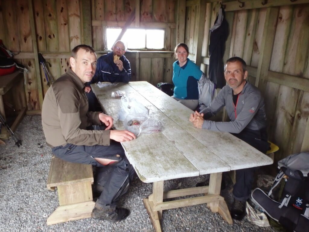 Jayme, Carl Lynsey and Peter in the hut