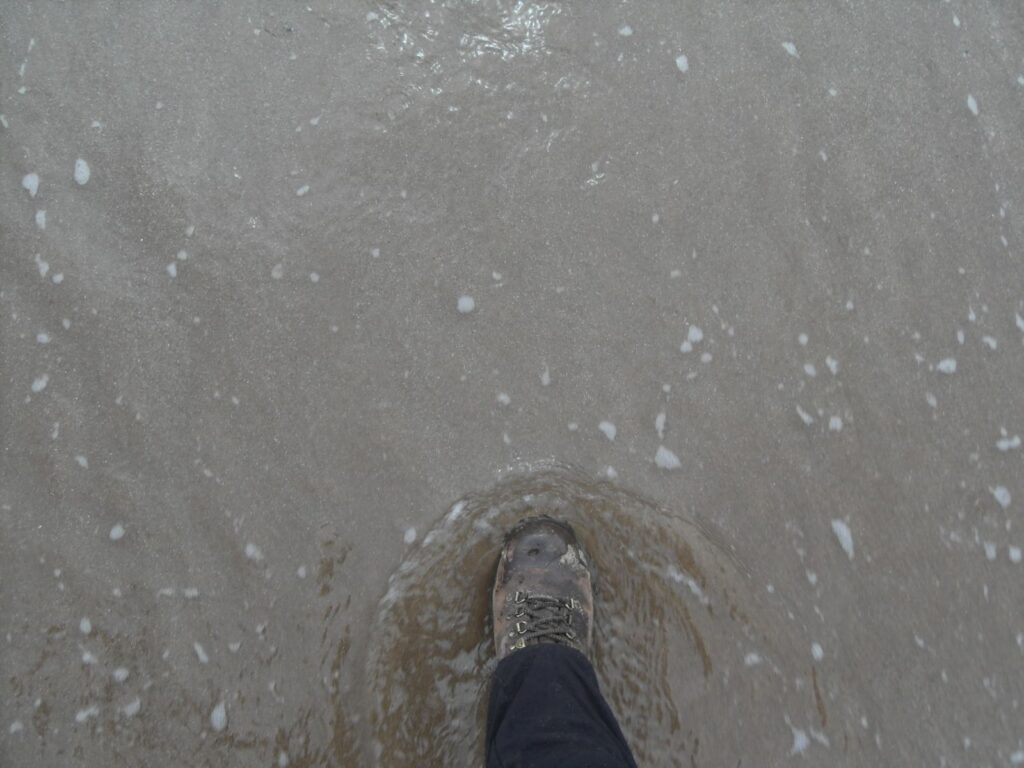 Louise's foot in North Sea at the beach
