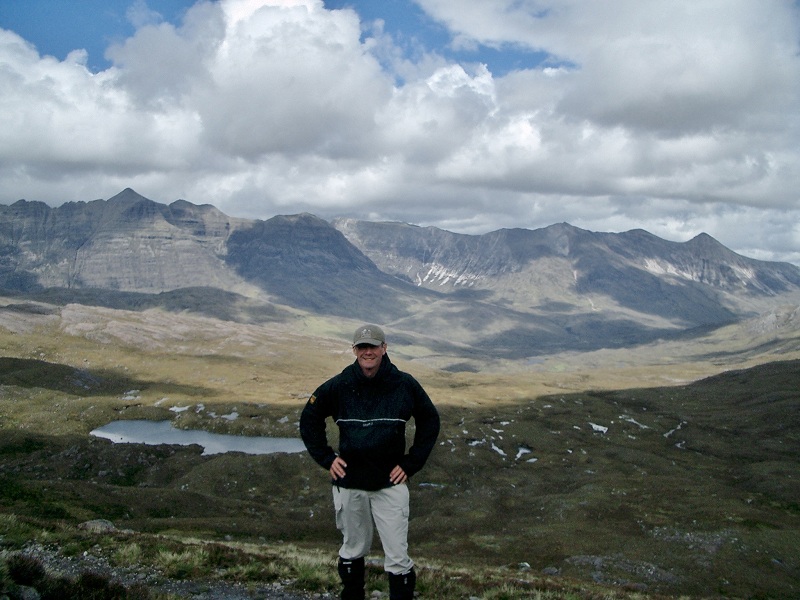 view of Torridon hills with Phil in foreground