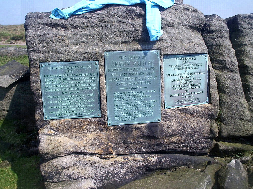 Ammon Wrigley memorial plaques set into rock