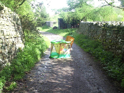 A wendy house in the road