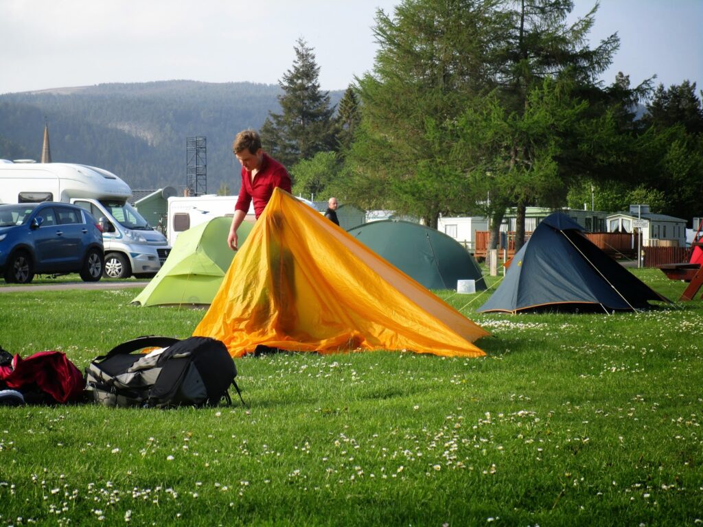 Toby putting up the tent