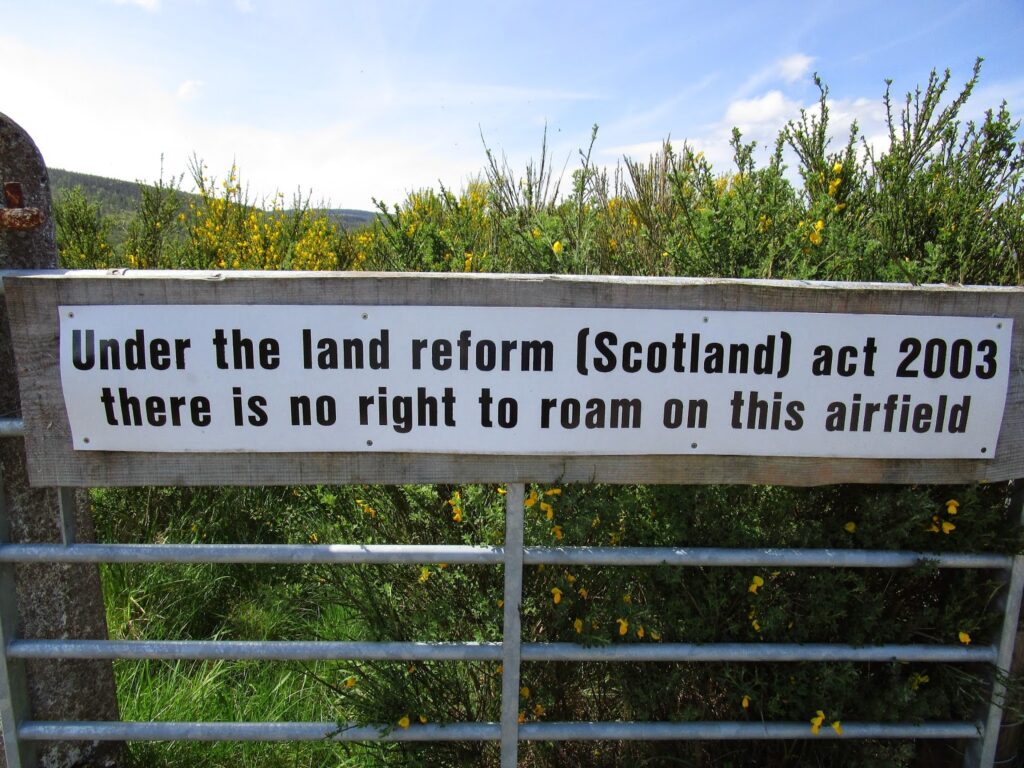 Sign warning not to enter airfield as there is no right to roam in the area
