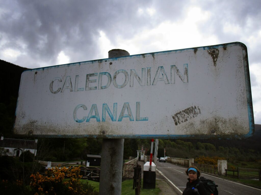 Weathered sign reading "Caledonian Canal"