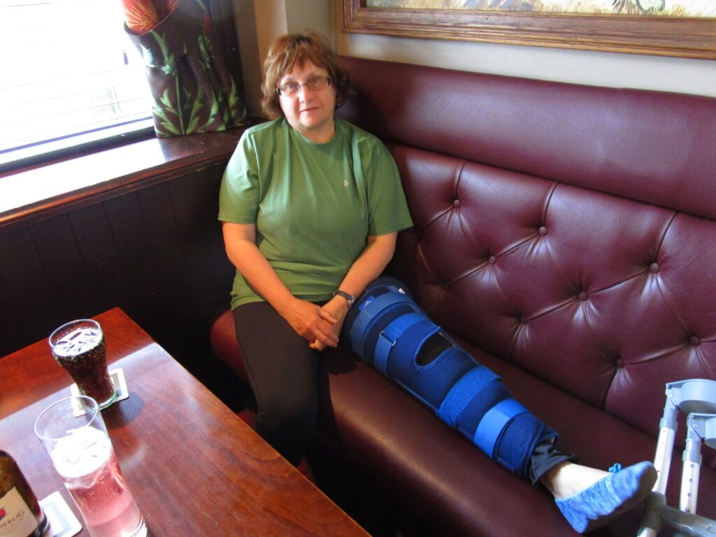 Vicky with leg in brace at the Tipsy Laird