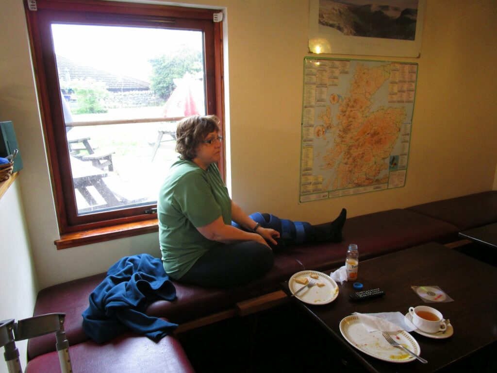 Vicky rests by the table after meal