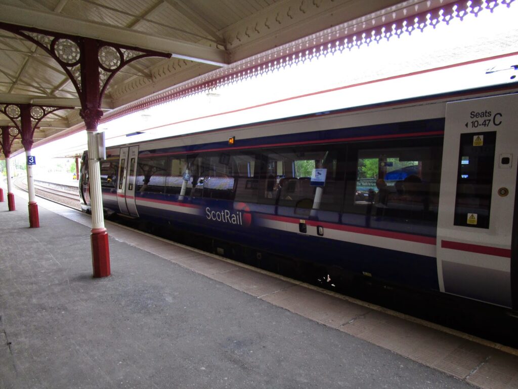 The train waiting at the platform at Kingussie station.