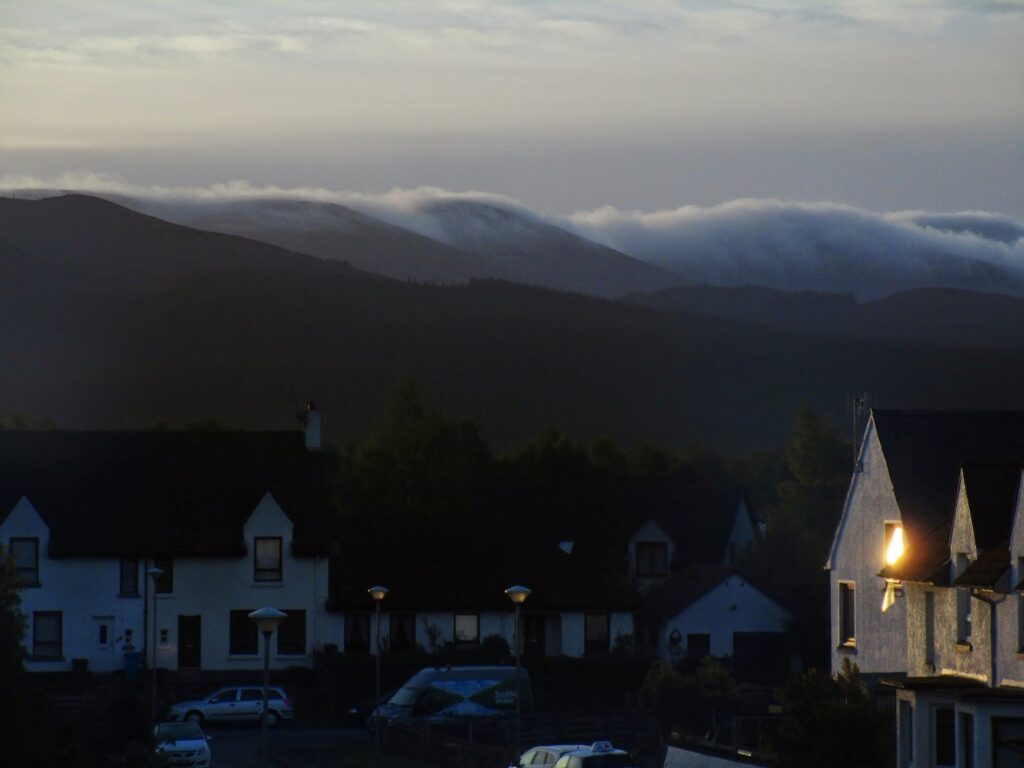 Early morning mist streaming off the mountainsides
